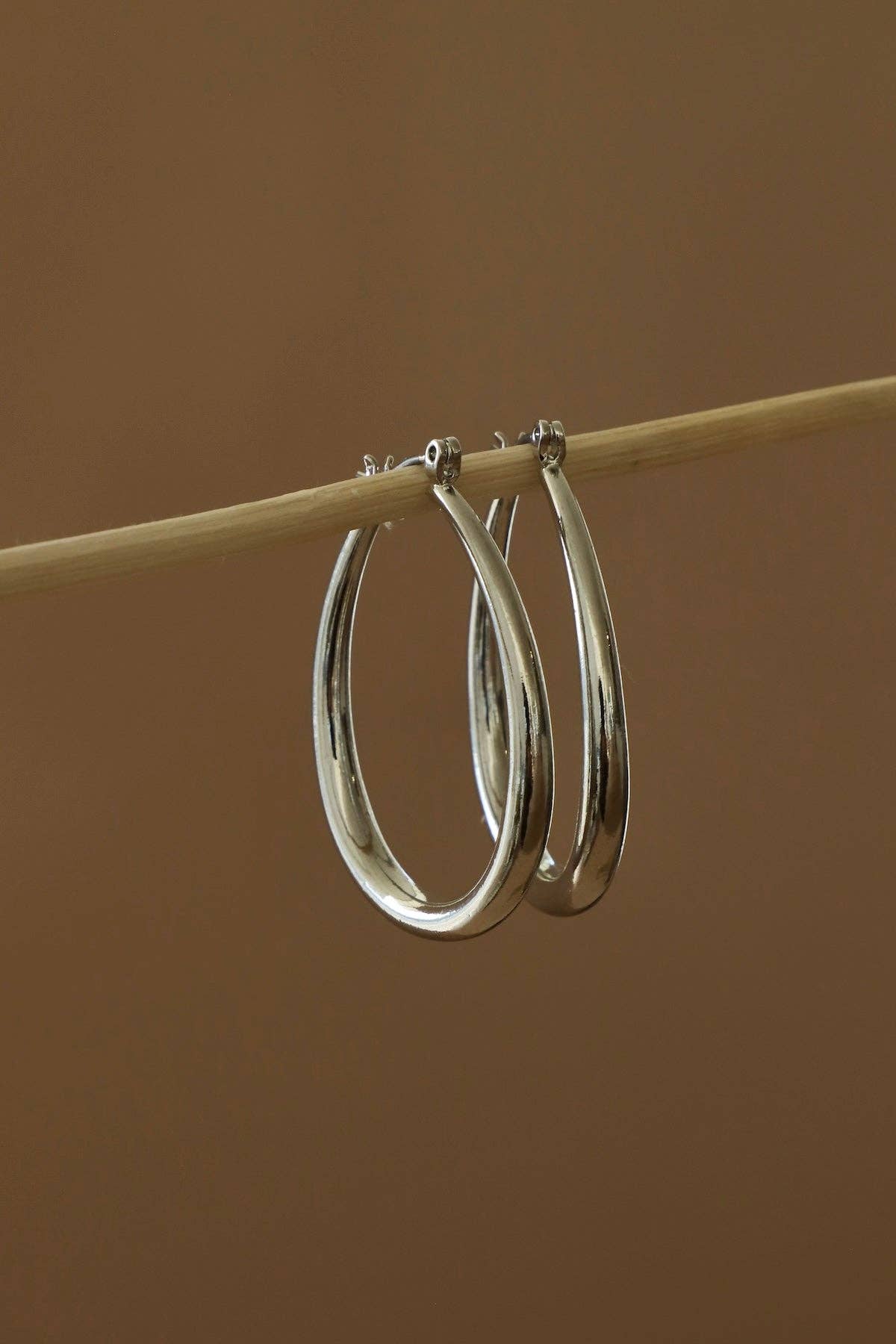 Large Teardrop Hoop Earrings: Silver